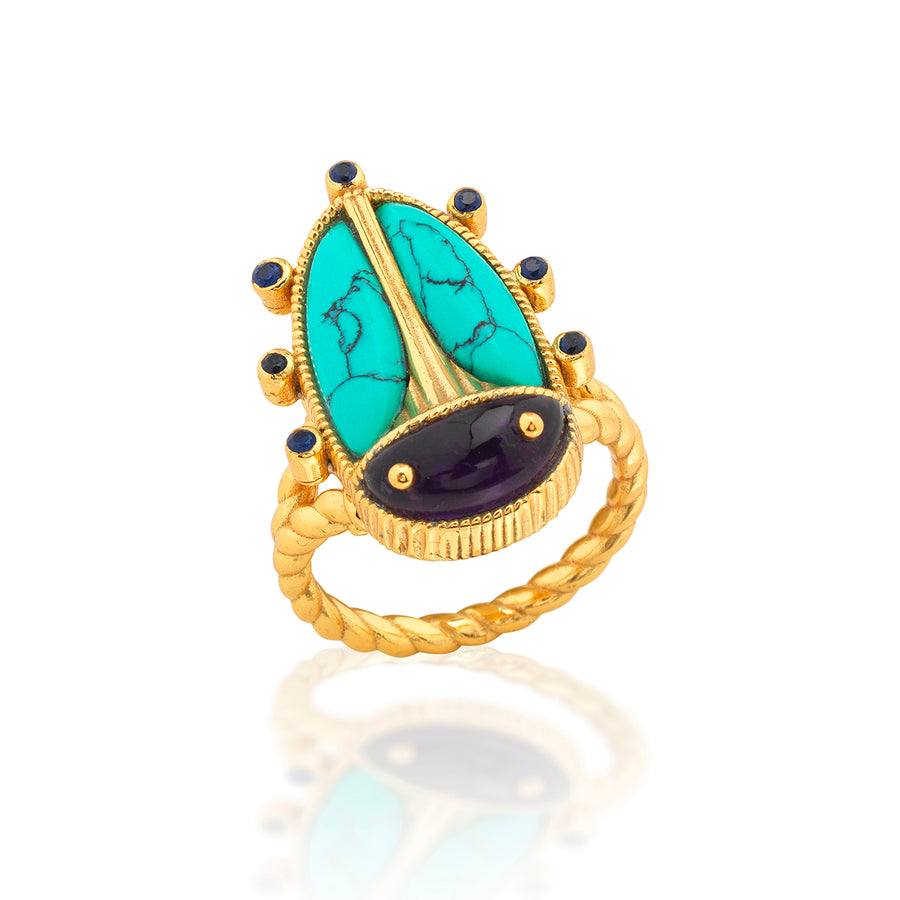 Gold beetle shaped ring with turquoise and black gemstones