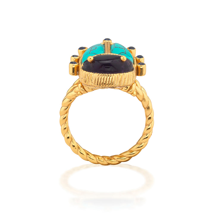 Gold beetle shaped ring with turquoise and black stone