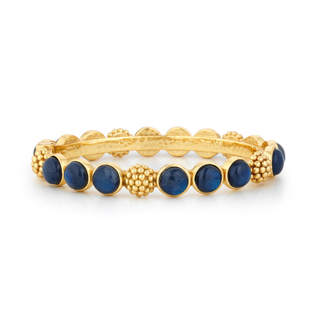 A labradorite bangle bracelet with a berry motif and labradorite stones