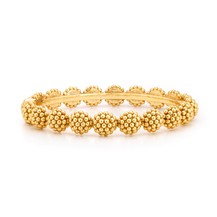 A bangle with a bramble berry design