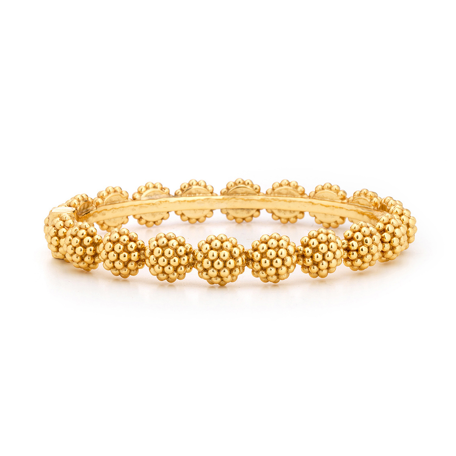 A bangle with a bramble berry design