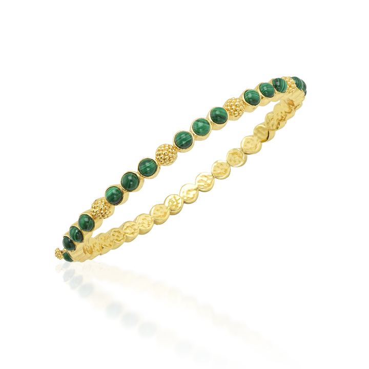 Gold bracelet with green beads