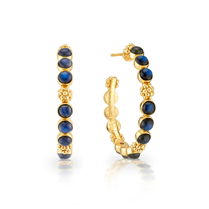Gold hoop earrings with blue gemstones 