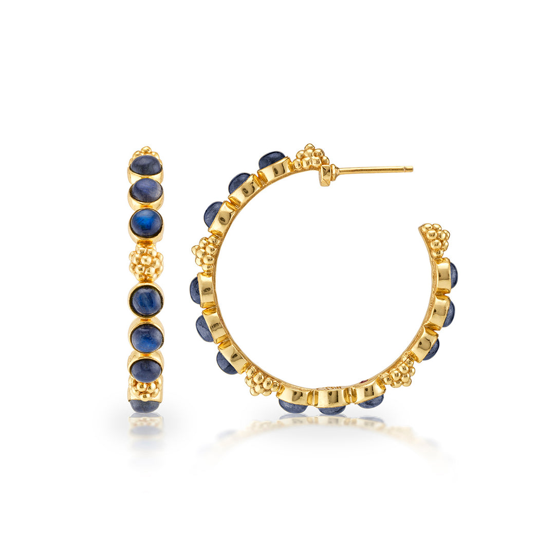 Gold hoop earrings with blue gemstones