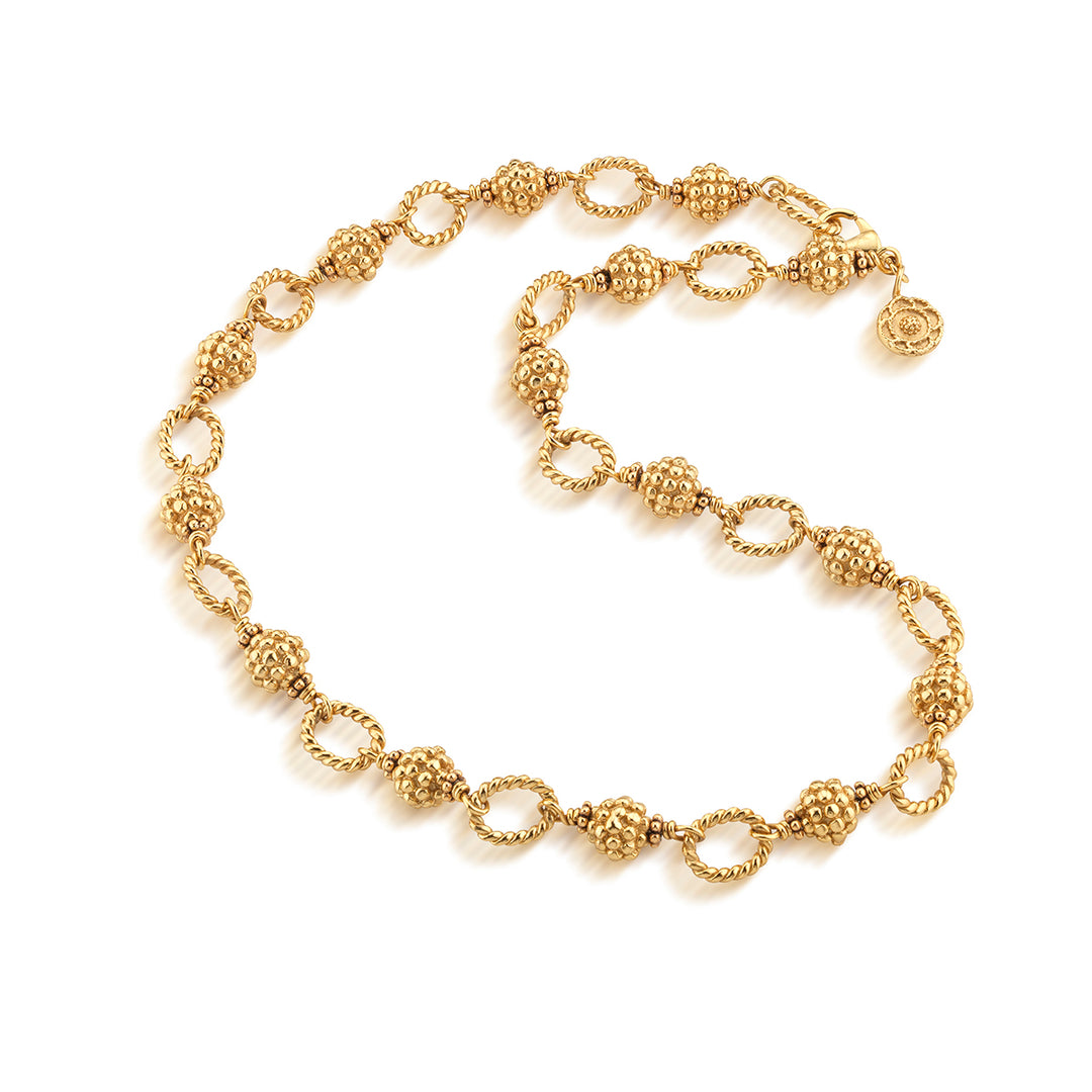 Gold chain bracelet with gold berry beads