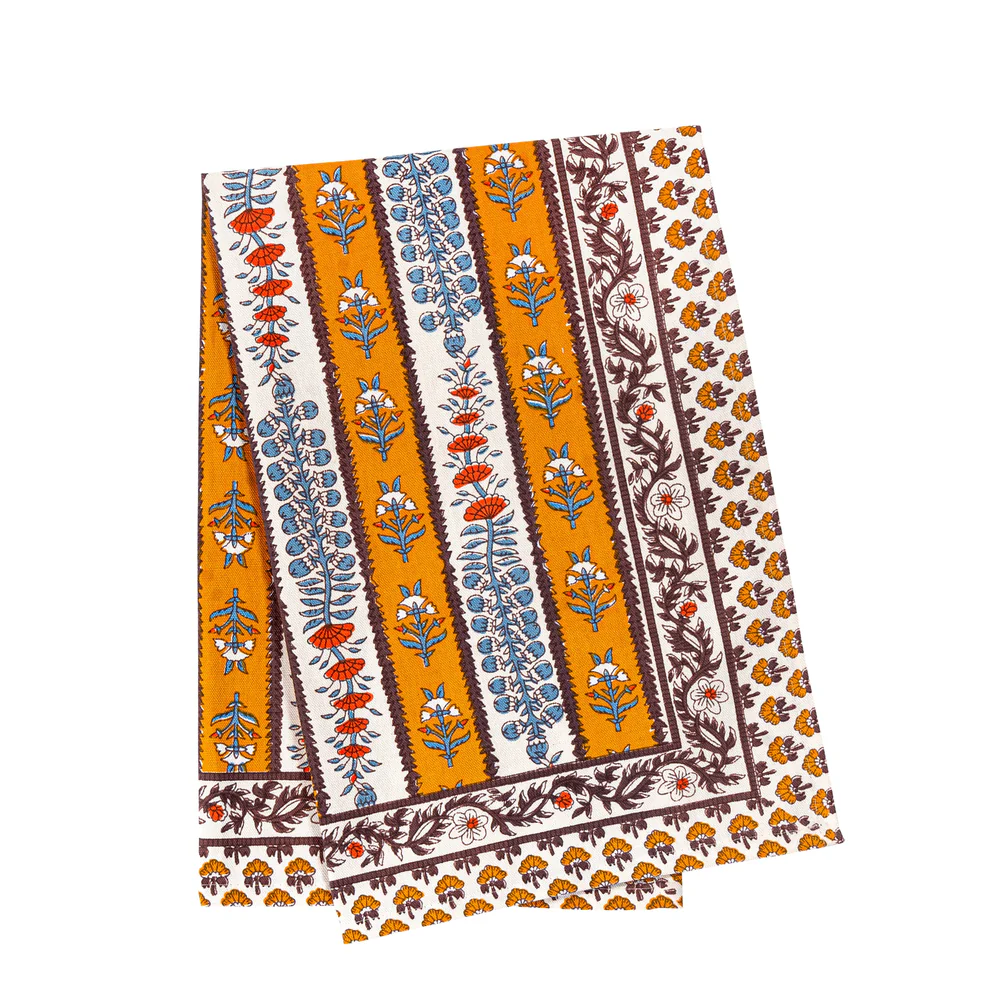 Decorativetea towel with floral pattern on a white background