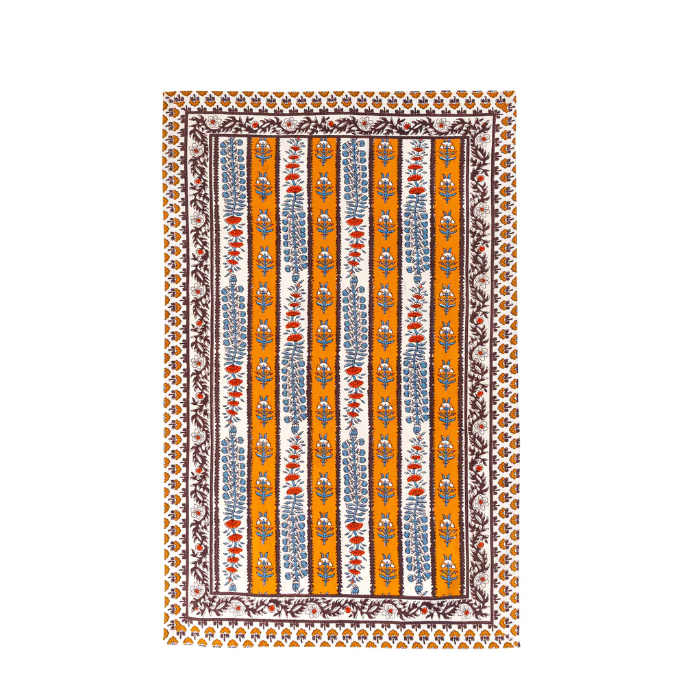 Decorative tea towel with a striped pattern on a white background