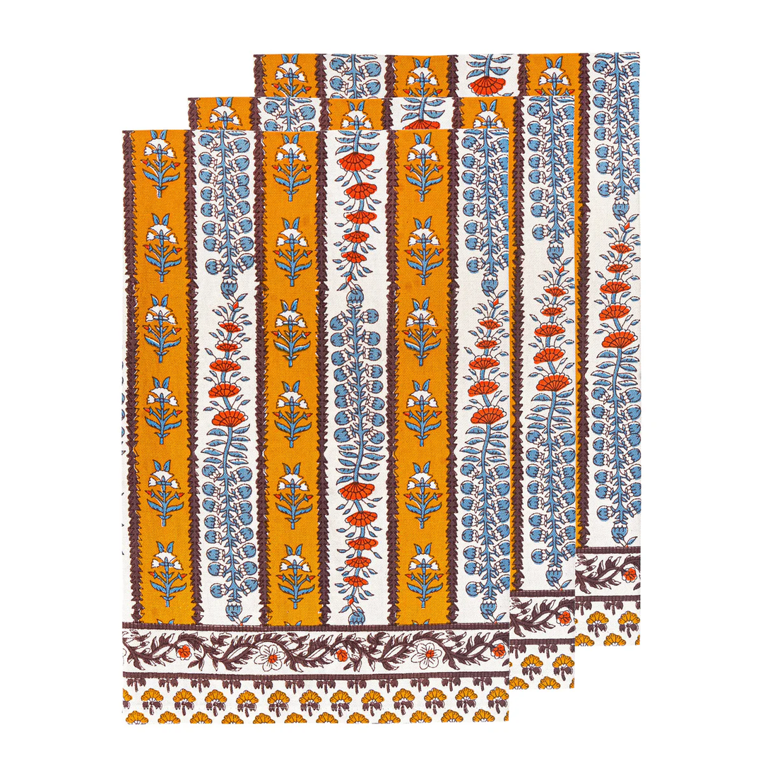 Decorative fabric with a floral pattern on an orange and white background