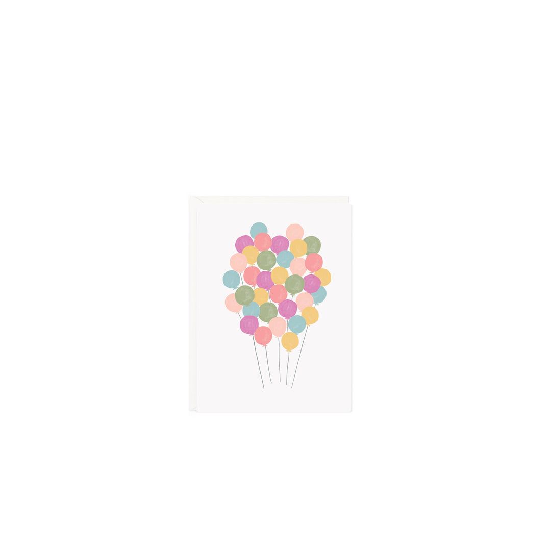Illustration of colorful balloons on a white birthday card