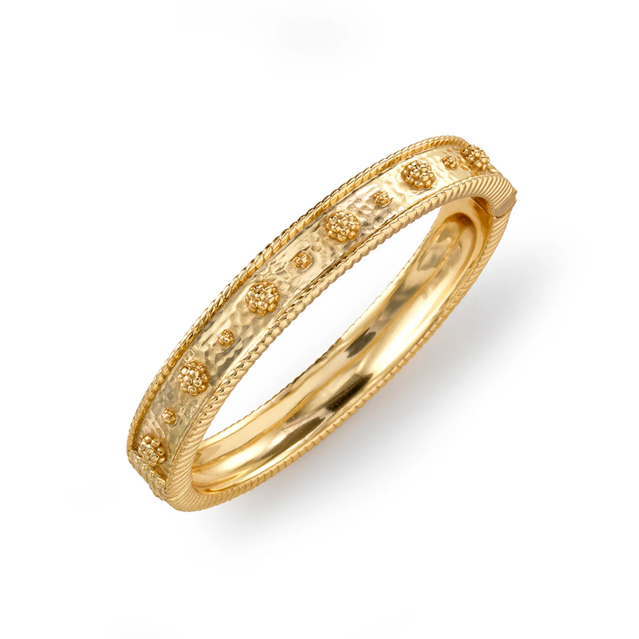 Gold ring with berry and thread design 