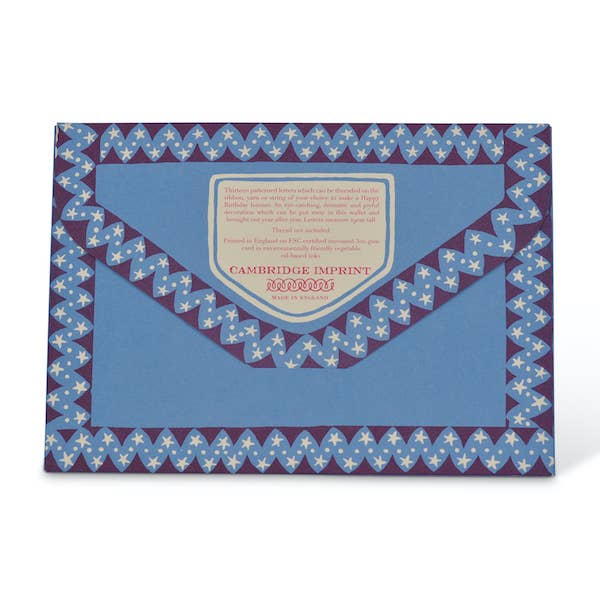 a blue envelope shaped package for a birthday banner 