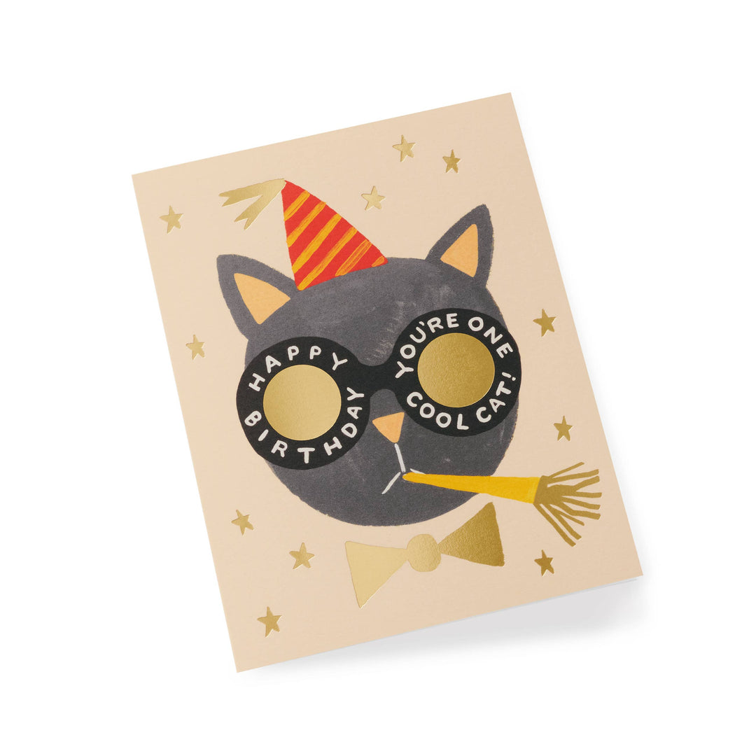 Birthday card with an illustration of a cat wearing sunglasses with the wrods "happy birthday - You're one cool cat! " around the rims and party hat on  beige paper