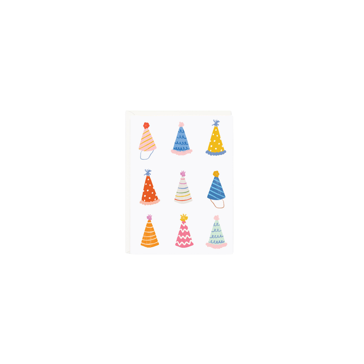 A gift enclosure card with an illustration of birthday party hats