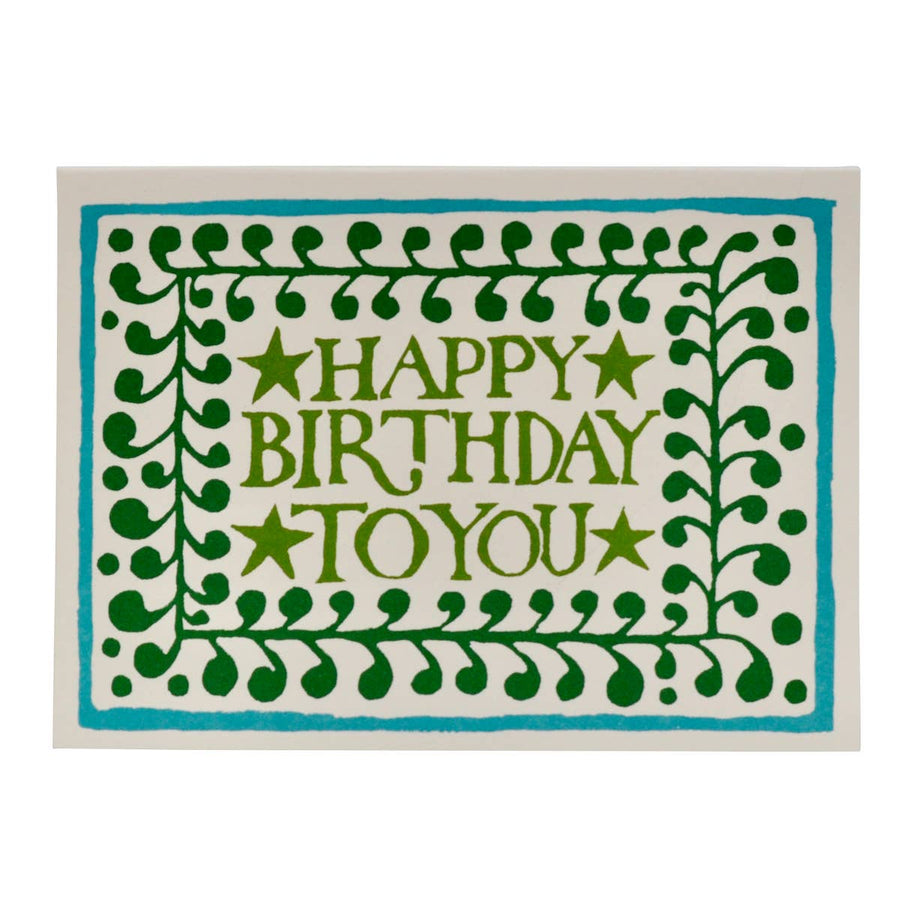 Card with 'Happy Birthday To You' text surrounded by green leaf patterns on a white background