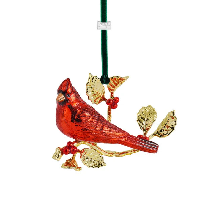 Cardinal bird ornament with one bird only not two male cardinals with gold leaves and red berries on a white background