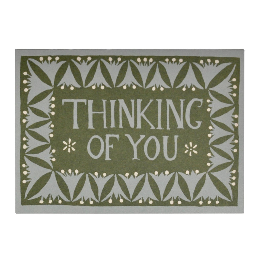 Decorative card with 'Thinking of You' text and green and pastel blue floral patterns