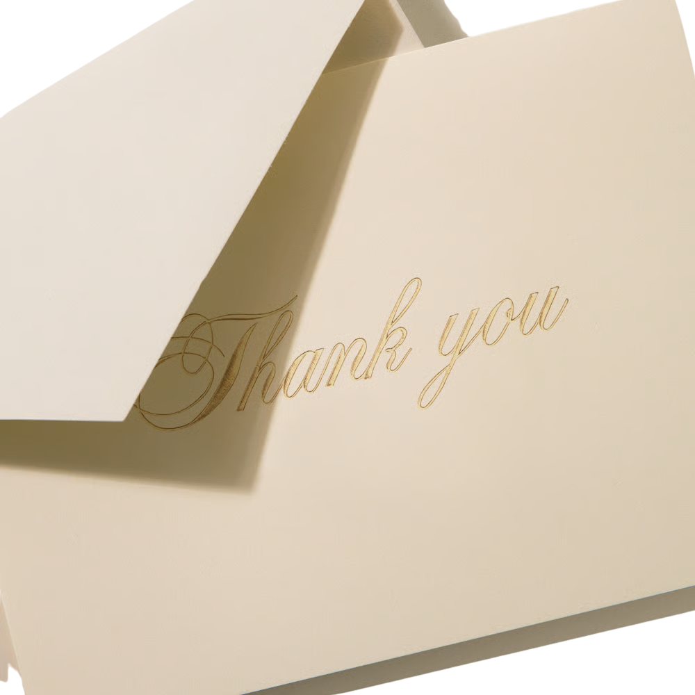 Ecru card with 'Thank you' engraved in gold script