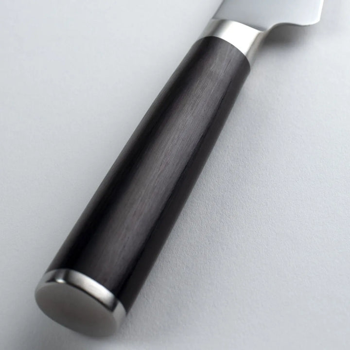 Knife with a dark wooden handle and silver blade on a light gray background