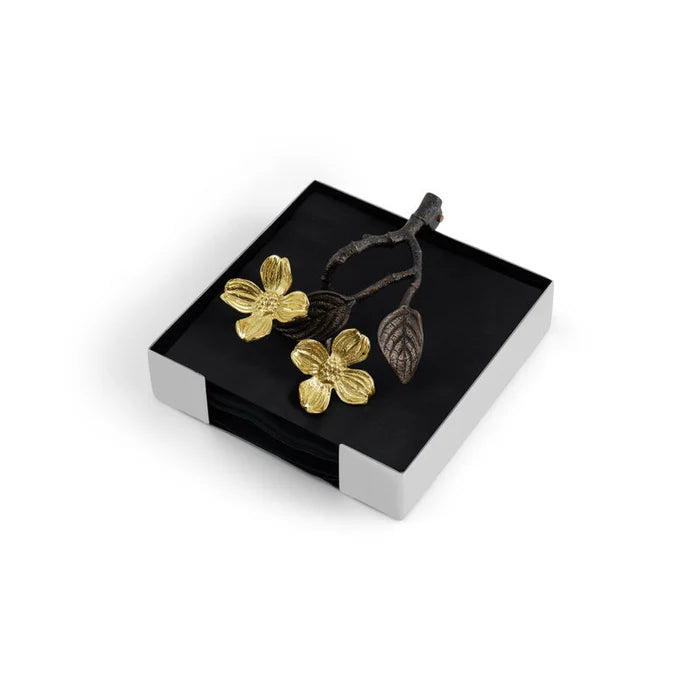 Silver napkin holder with a weight made of bronze with gold dogwood flowers