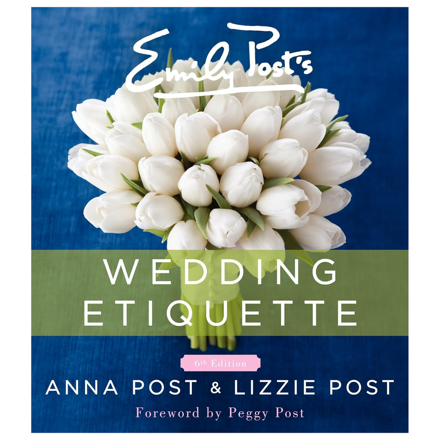 Book cover of Emily Post's 'Wedding Etiquette' with white tulips on a blue background