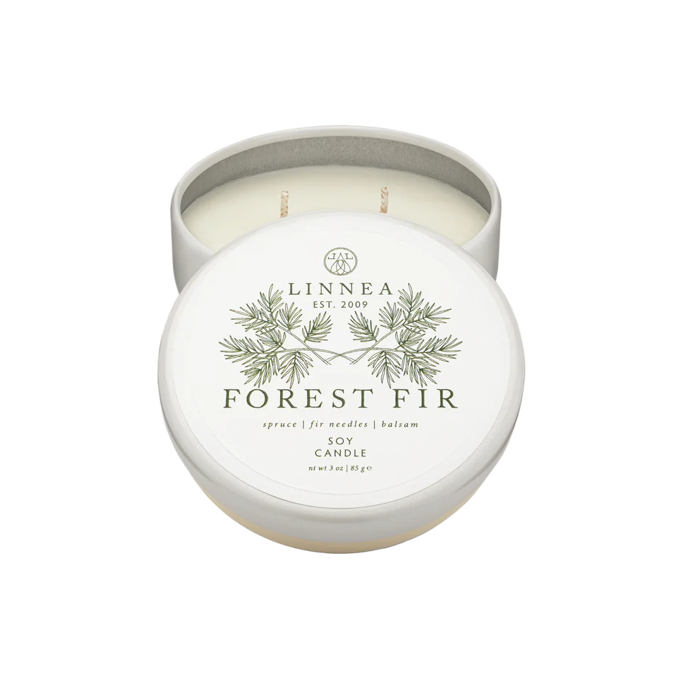 Linnea Forest Fir candle in a white petit travel tin on a white background