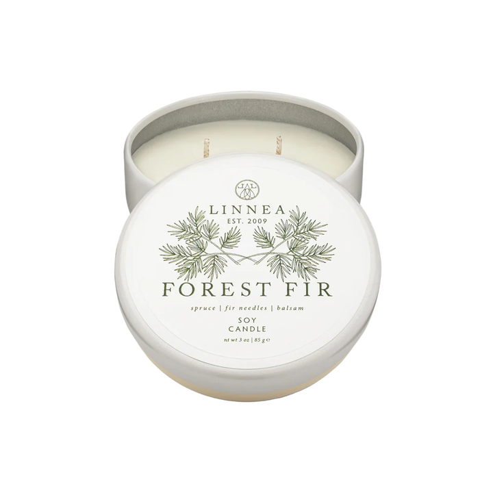 Linnea Forest Fir candle in a white petit travel tin on a white background