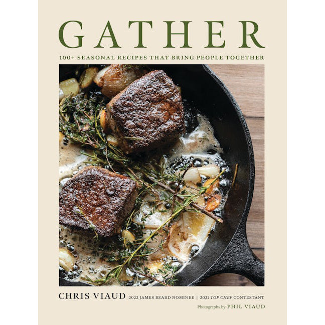Cookbook cover with a skillet of food and the title 'Gather' on a beige background