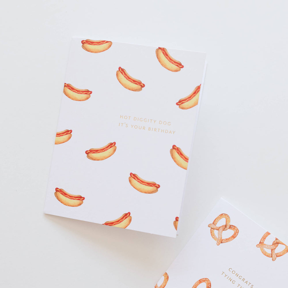 Card with hot dog illustrations and text on a white background