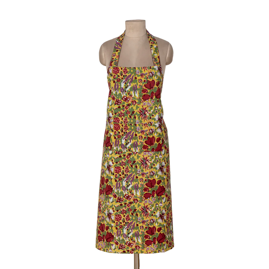 Floral apron on a mannequin against a white background