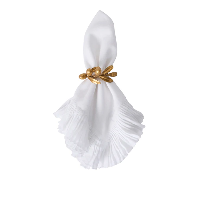 white napkin held by olive gold napkin ring
