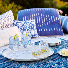 Load image into Gallery viewer, Juliska Puro Marbled Blue Goblet on a tray with stemless white wine glasses
