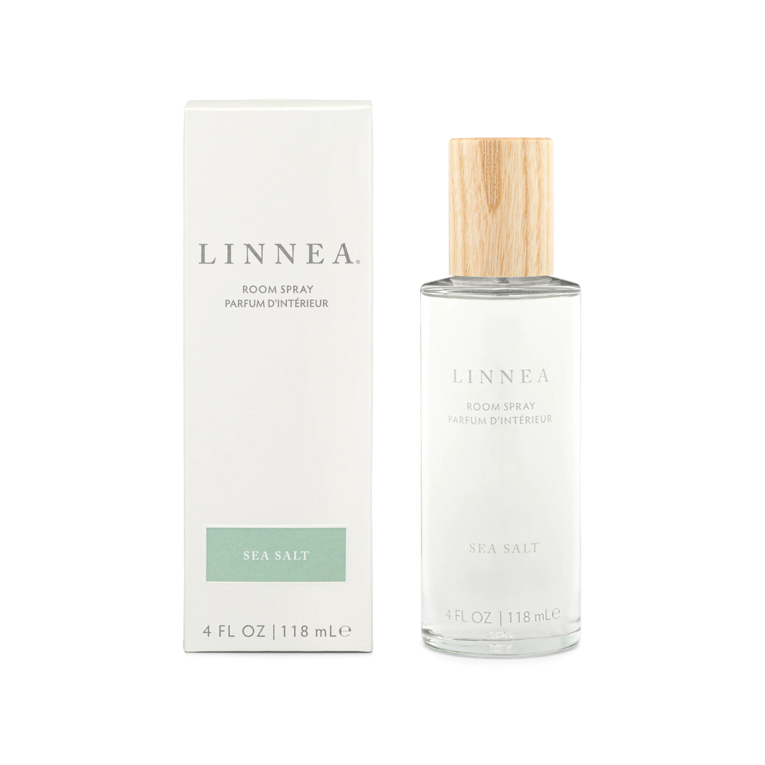 Linnea sea salt room spray bottle next to its packaging