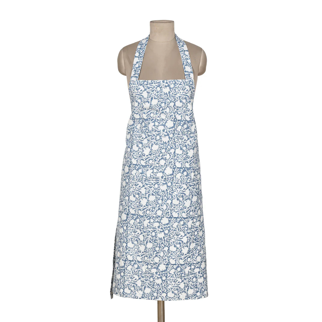 Floral apron on a mannequin against a white background