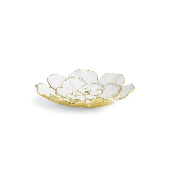 Decorative dish with white floral design and gold rim on a white background