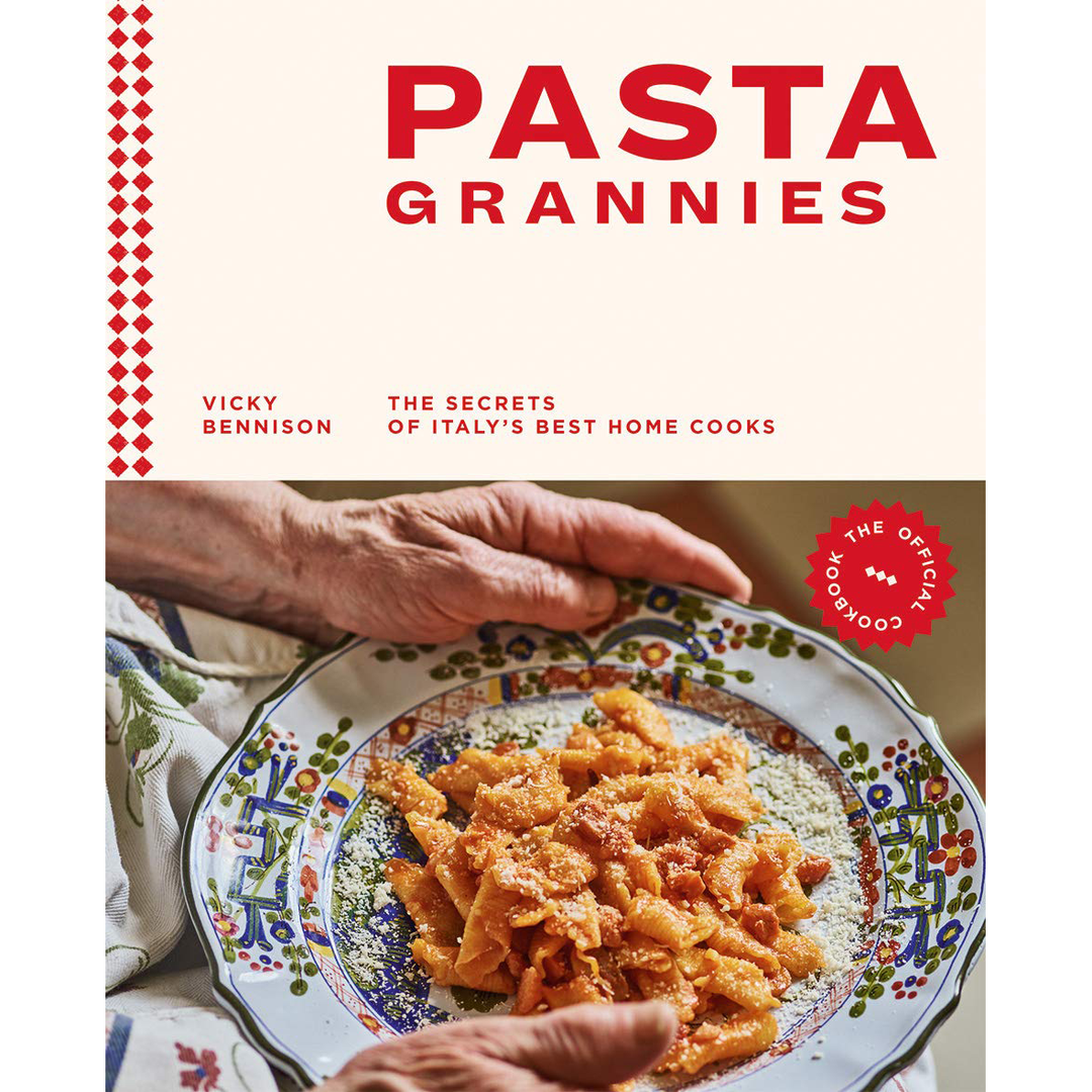Book cover of 'Pasta Grannies' with a hand holding a plate of pasta.