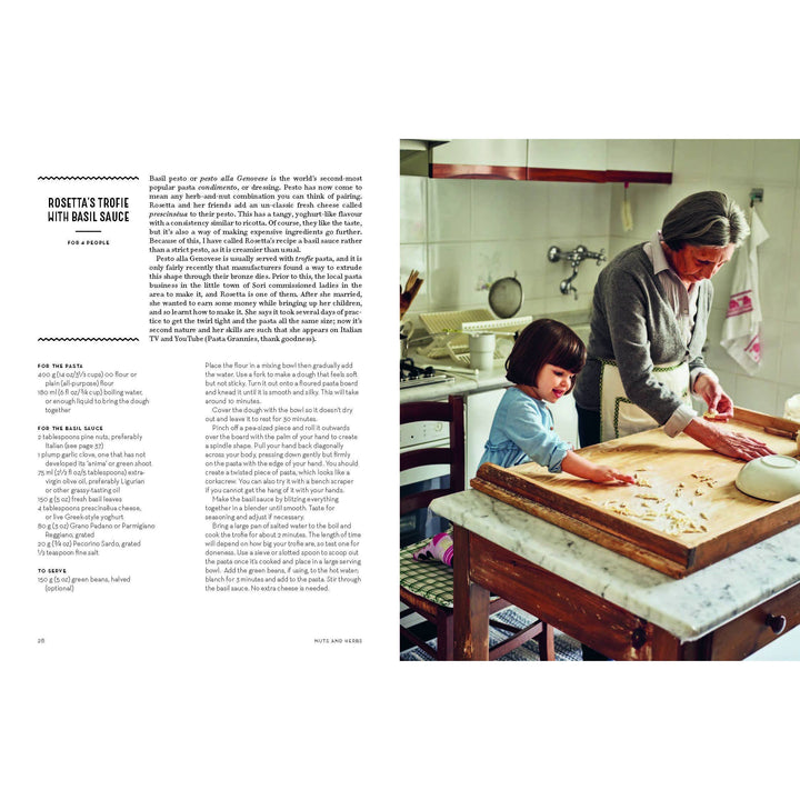 Woman and child in a kitchen preparing food together.