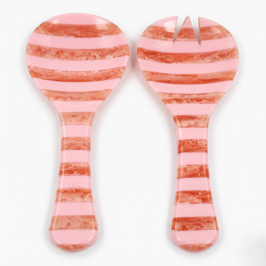 A two-piece plastic salad spinner and fork set with a pink and coral-orange striped pattern, shown on a plain white background.