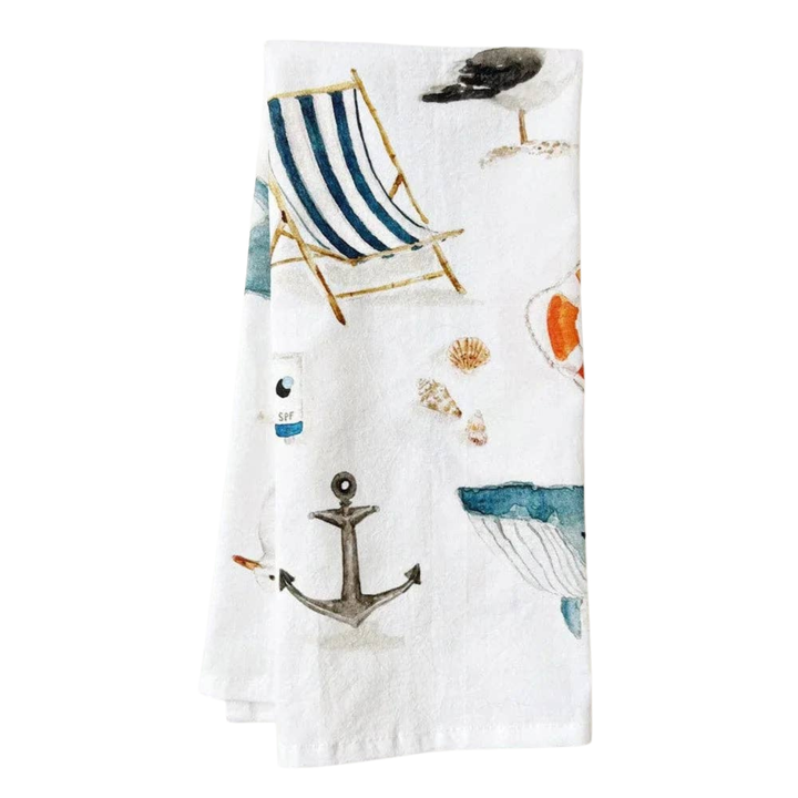 Nautical-themed towel with anchor, life buoy, and deck chair design on a white background