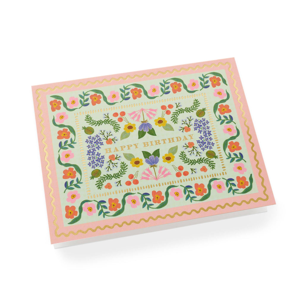 Greeting card with floral design and 'Happy Birthday' text
