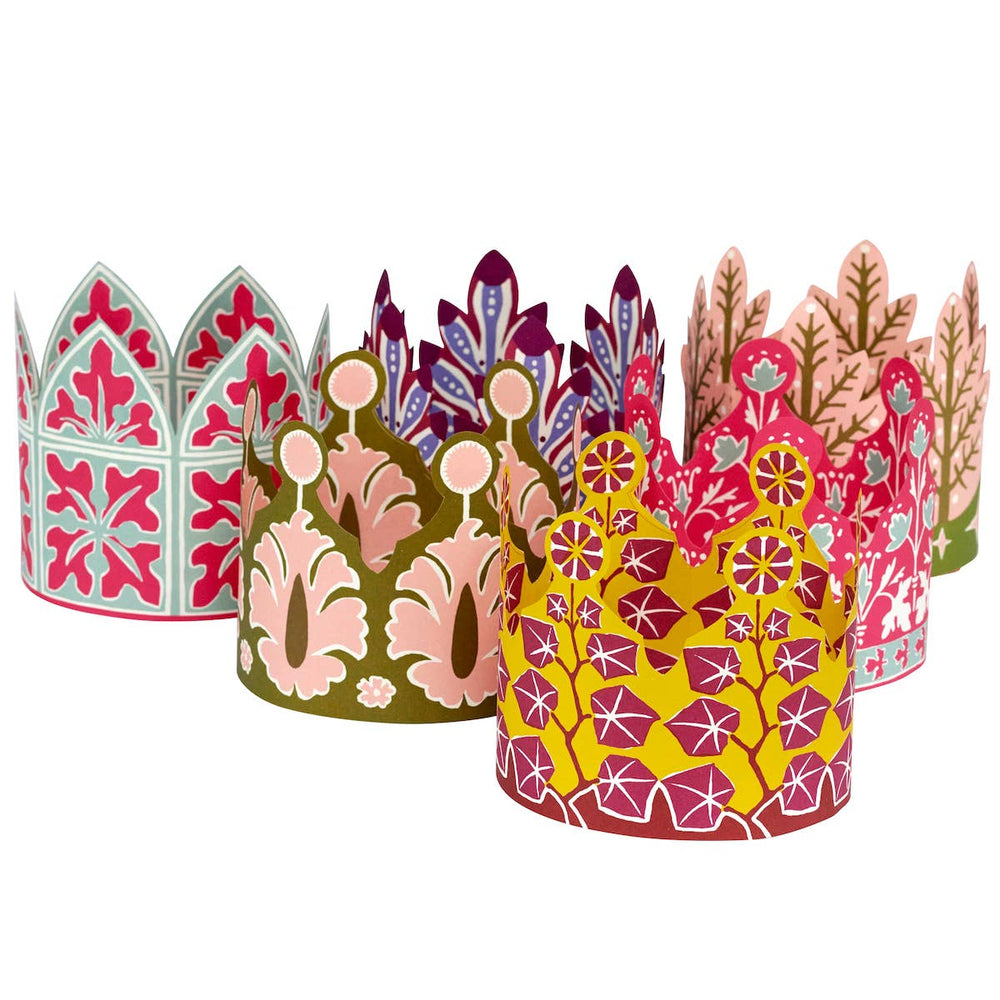 Set of colorful paper crowns with floral patterns