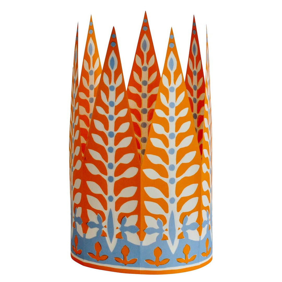 A patterned blue and orange paper crown