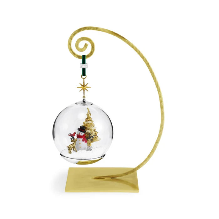 snowglobe christmas ornament with a snowman and a gold christmas tree and baby reindeer on a gold stand, 
