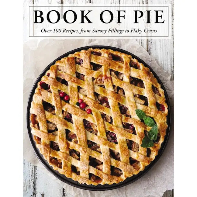 Book cover of 'Book of Pie' with a lattice-topped pie on a wooden surface