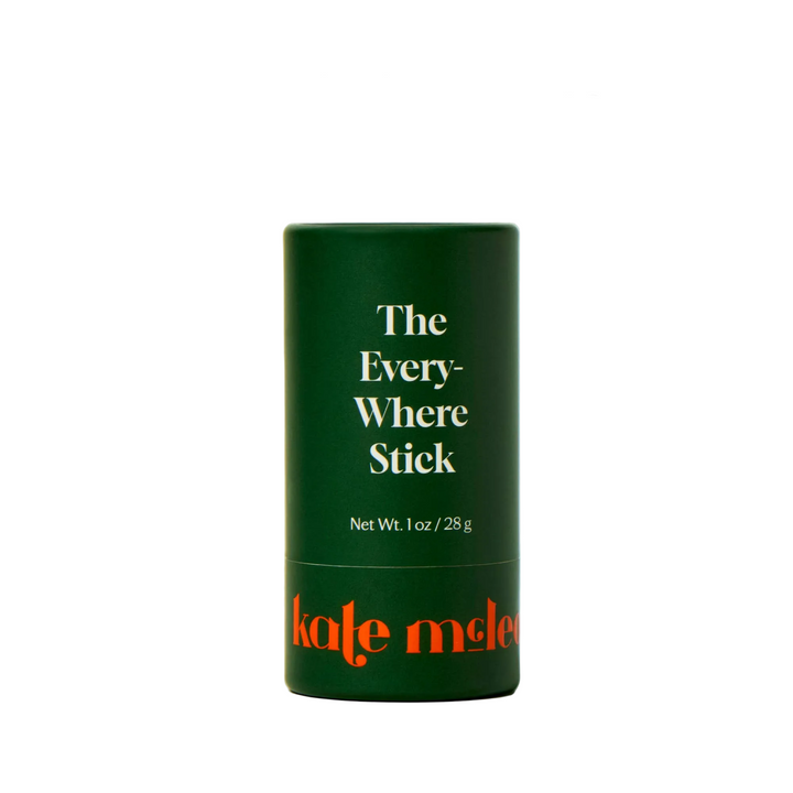 A dark green cylindrical product container labeled 'The Everywhere Stick' with orange 'kate mcleod' branding and white text, centered on a white background with the headline 'RECYCLABLE PAPER PACKAGING' above it.