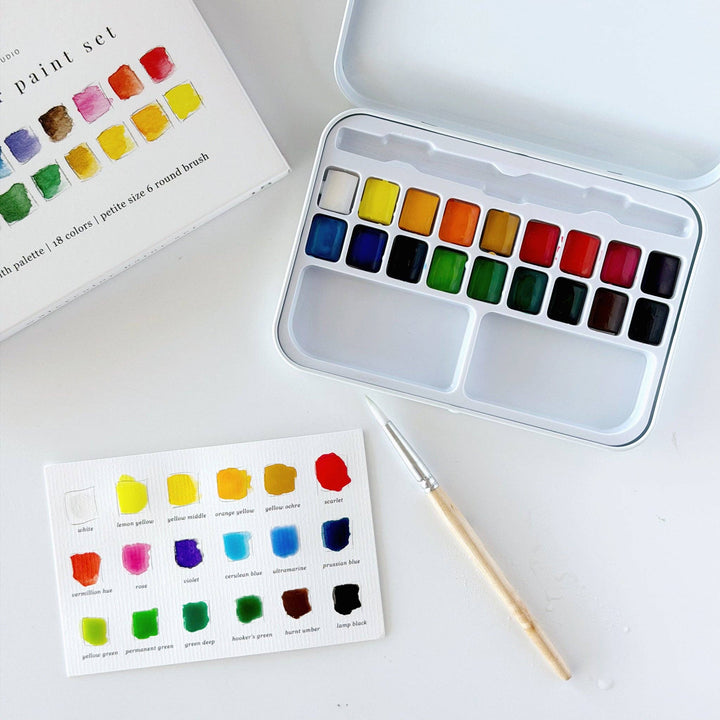 Watercolor paint set with color swatches 