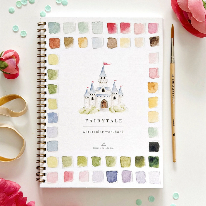 Fairytale watercolor workbook with castle illustration 