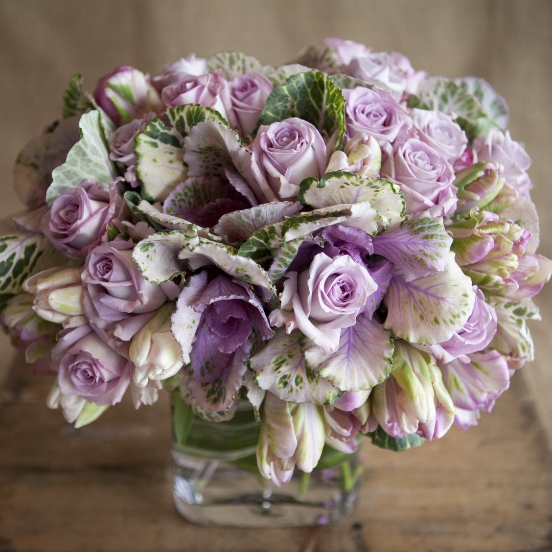 Designers choice arrangement purple roses