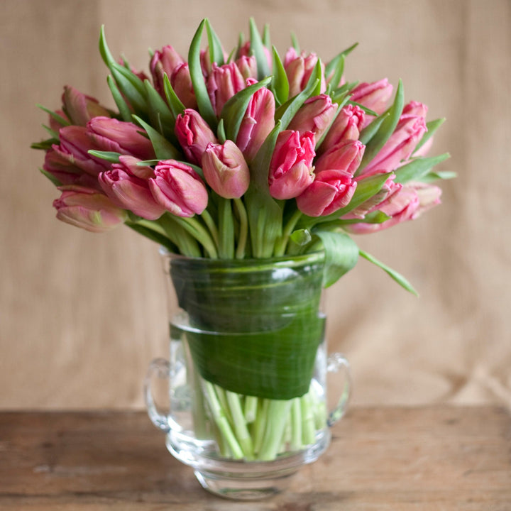 Single Element Arrangement pink tulips in glass vase