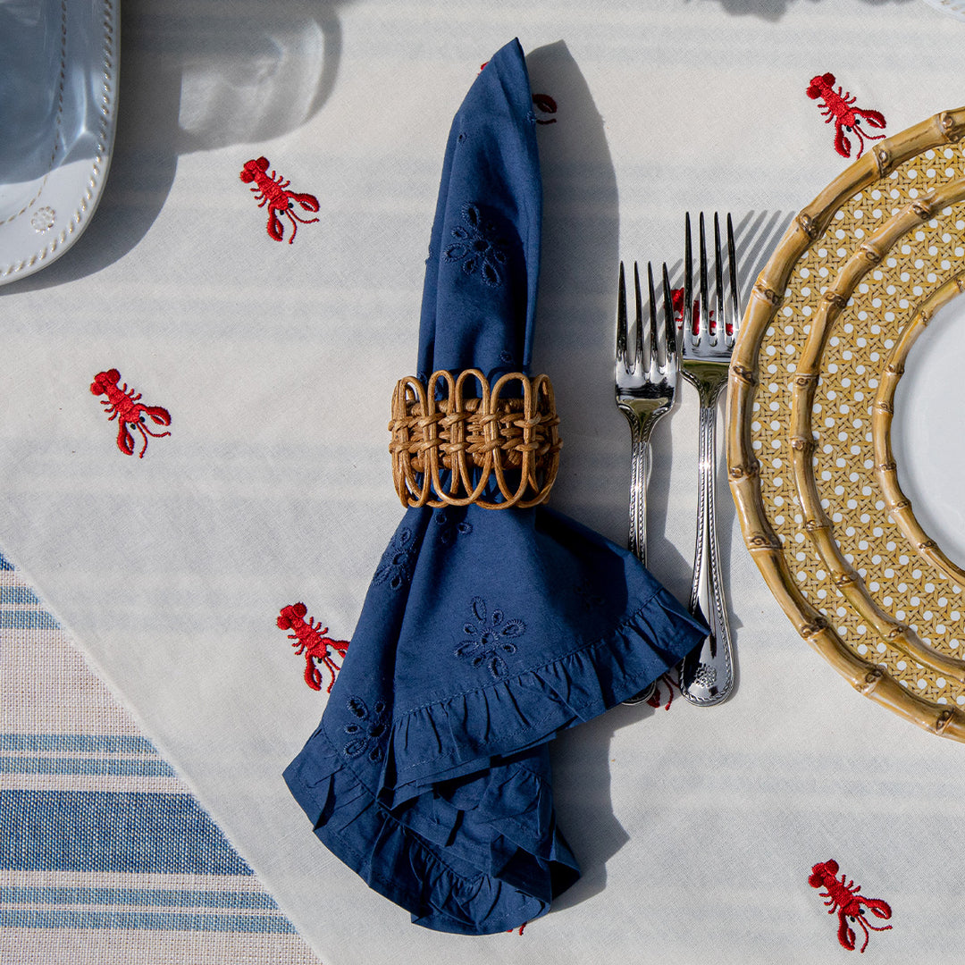 Juliska Eyelet Navy Napkin with provence rattan napkin ring