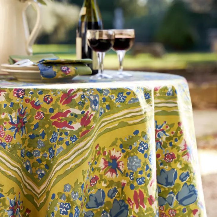 couleur nature jardin red and green tablecloth with outdoor dining setting